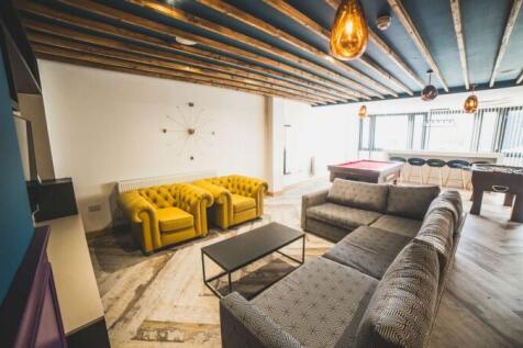 Bright and spacious communal lounge featuring s...