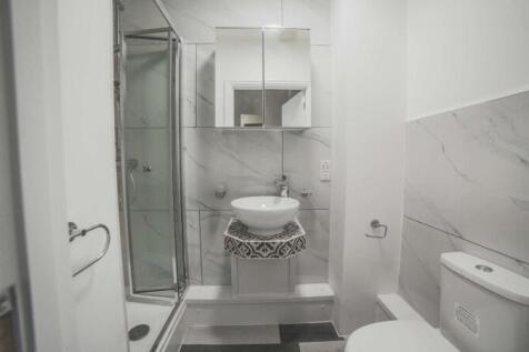 Modern bathroom featuring a stylish vessel sink...