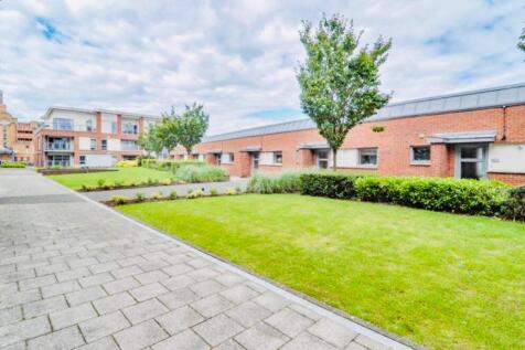 Bright and well-maintained front exterior of a ...