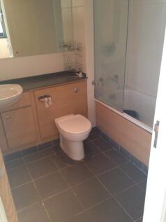 Modern bathroom suite featuring a clean design ...
