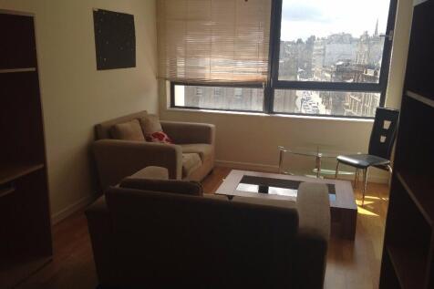A cozy living room with comfortable seating and...