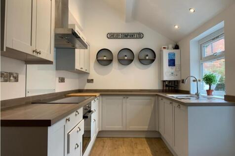 Modern, well-appointed kitchen featuring sleek ...