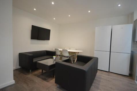 A modern and inviting living room with ample se...
