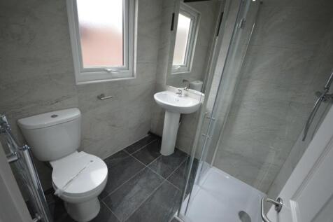 A modern and clean bathroom featuring a stylish...