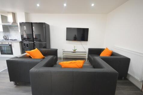 A stylish living room featuring modern furnitur...