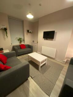A cozy and inviting living room, perfect for so...