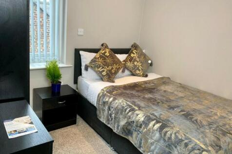 A cozy and inviting double bedroom perfect for ...