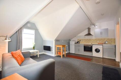 Bright and welcoming living area featuring a co...