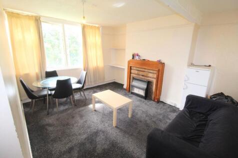 Bright and comfortable living room featuring a ...