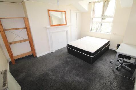 Bright and well-lit double bedroom featuring a ...