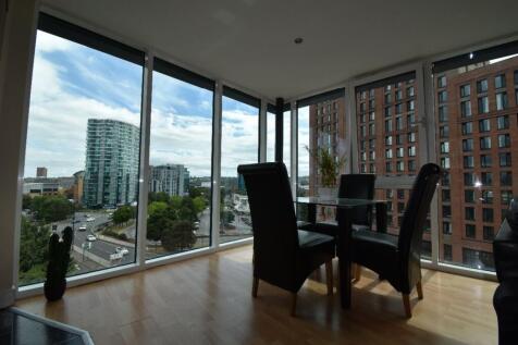 A spacious and bright modern living room with l...