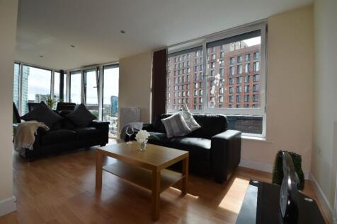 A spacious and bright modern living room with l...