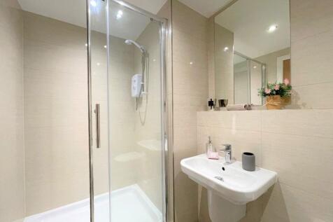 A modern and clean bathroom featuring a stylish...