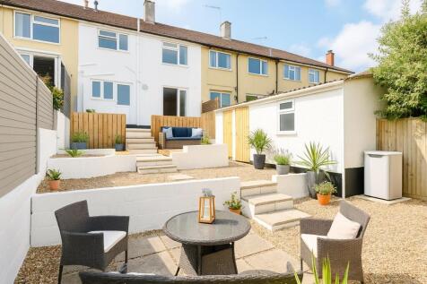 A bright and well-maintained tiered garden feat...