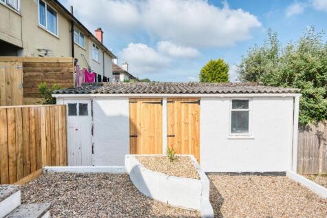 Well-maintained front exterior of a terraced ho...