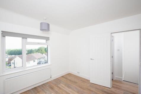 Bright and clean empty room with a large window...