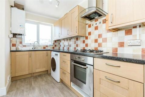 Bright and functional kitchen featuring modern ...