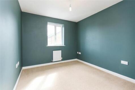 A neatly presented double bedroom with soothing...