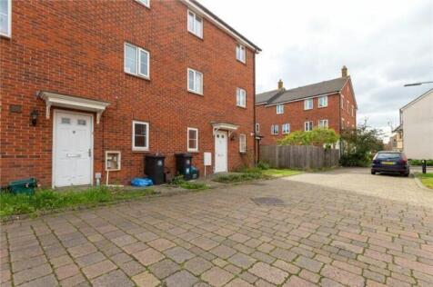 Well-maintained front exterior of a charming br...