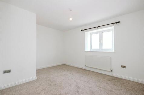 Bright and clean double bedroom featuring fresh...