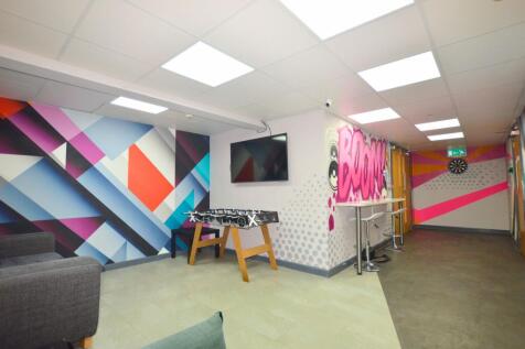 Bright and vibrant communal lounge featuring mo...