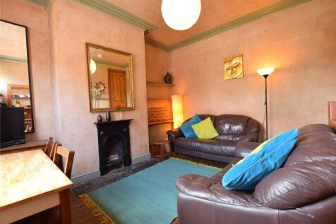 Cozy living room featuring comfortable leather ...