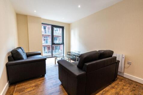 Bright and modern living room featuring comfort...