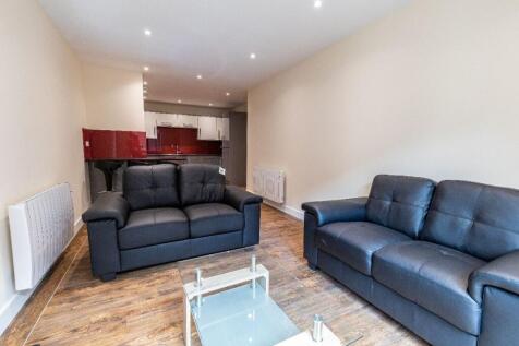 A modern living room featuring two comfortable ...