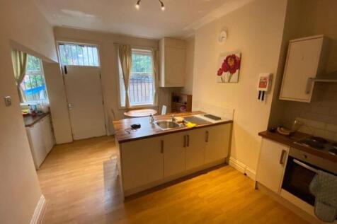 A bright and well-maintained kitchen featuring ...