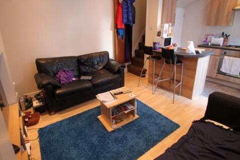 Bright and cozy living room featuring comfortab...