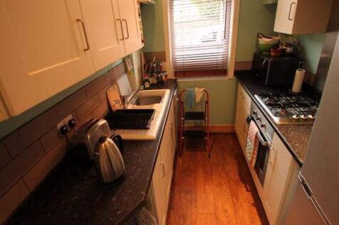 Bright and well-maintained kitchen with modern ...
