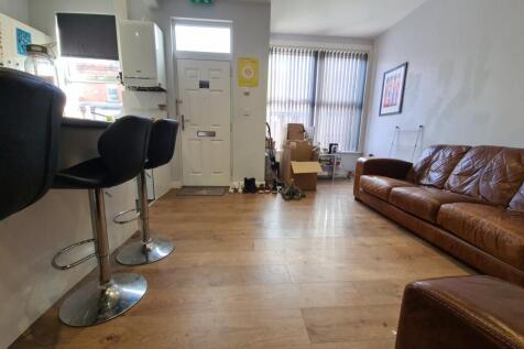 Bright and welcoming living room featuring mode...