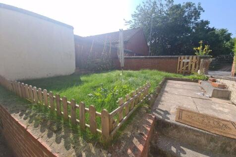 Bright and inviting garden area with a well-kep...