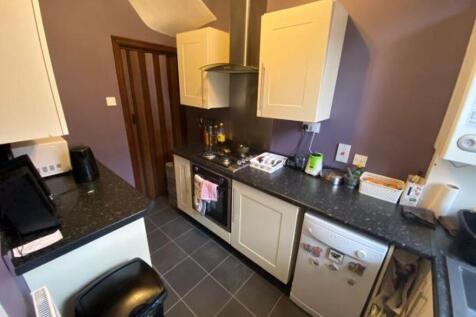 A modern and well-equipped kitchen featuring a ...