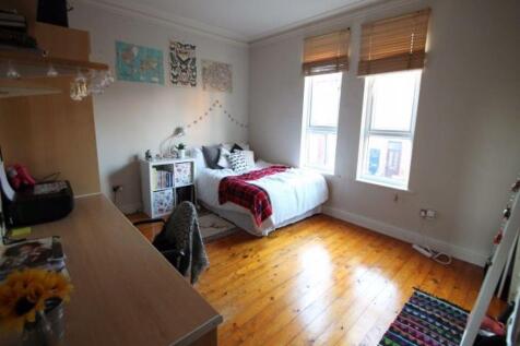 A bright and charming single bedroom with polis...