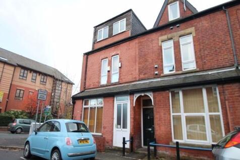 A charming red-brick terraced house featuring c...
