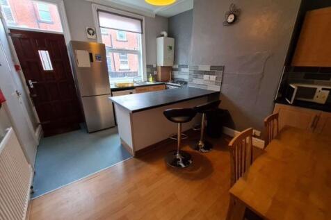 A bright and functional kitchen featuring a bre...