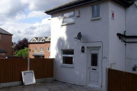 Front view of a well-maintained semi-detached h...