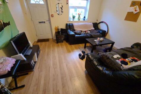 A cozy living room featuring two comfortable bl...