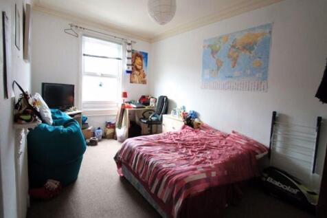 Bright and cozy double bedroom featuring a comf...