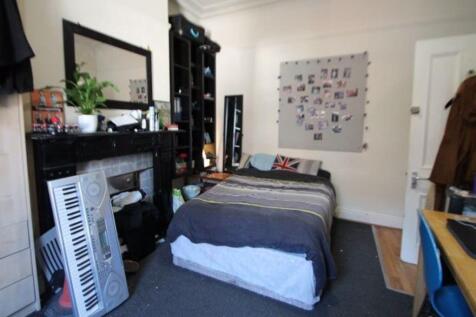 Cozy double bedroom featuring a comfortable dou...