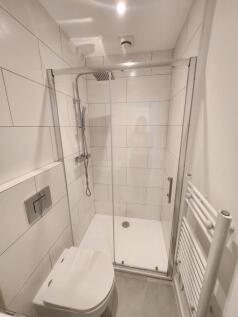 A modern, well-maintained bathroom featuring a ...