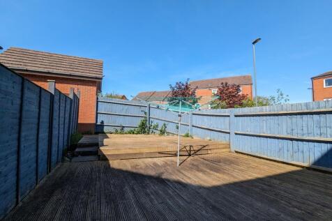Bright and spacious garden area with wooden dec...