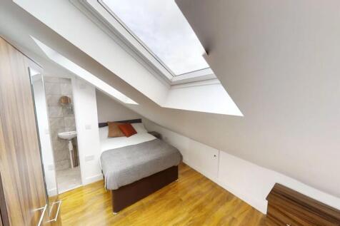 Bright and inviting double bedroom featuring a ...