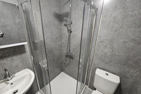 Modern and well-maintained bathroom featuring a...