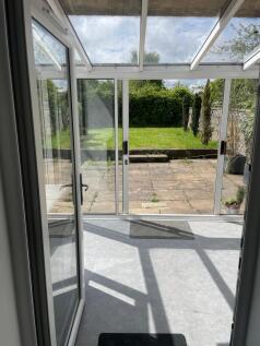 Bright and inviting garden space with a spaciou...