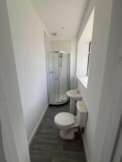 Bright and clean bathroom featuring a modern co...