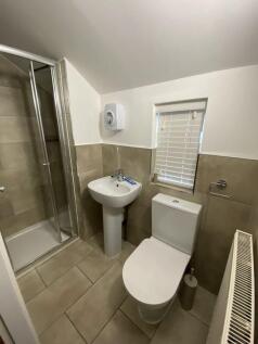 A modern and well-maintained bathroom featuring...