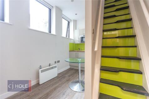 Bright and clean hallway featuring modern lime ...