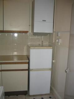 Compact kitchen space featuring practical cabin...